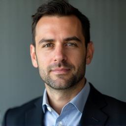 Professional headshot of Ivan Dimitrov with a focused expression.